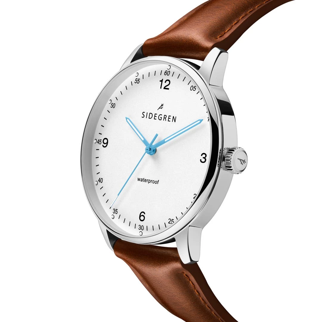 Sidegren Olivier | Montre En Acier Inoxydable Argenté Avec Bracelet Marron & Aiguilles Bleues 4 Sidegren Olivier | Montre En Acier Inoxydable Argenté Avec Bracelet Marron & Aiguilles Bleues – Image 2